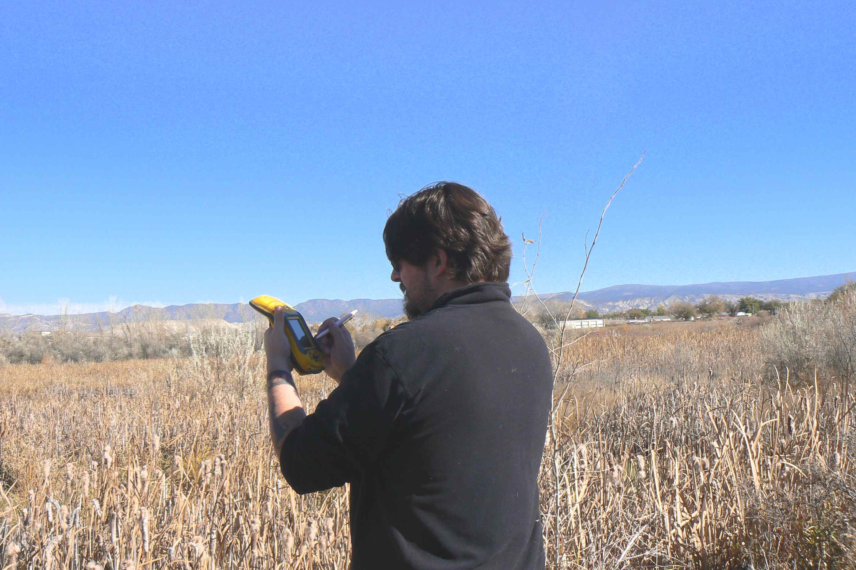 Seth Fram GPSing photo point 2